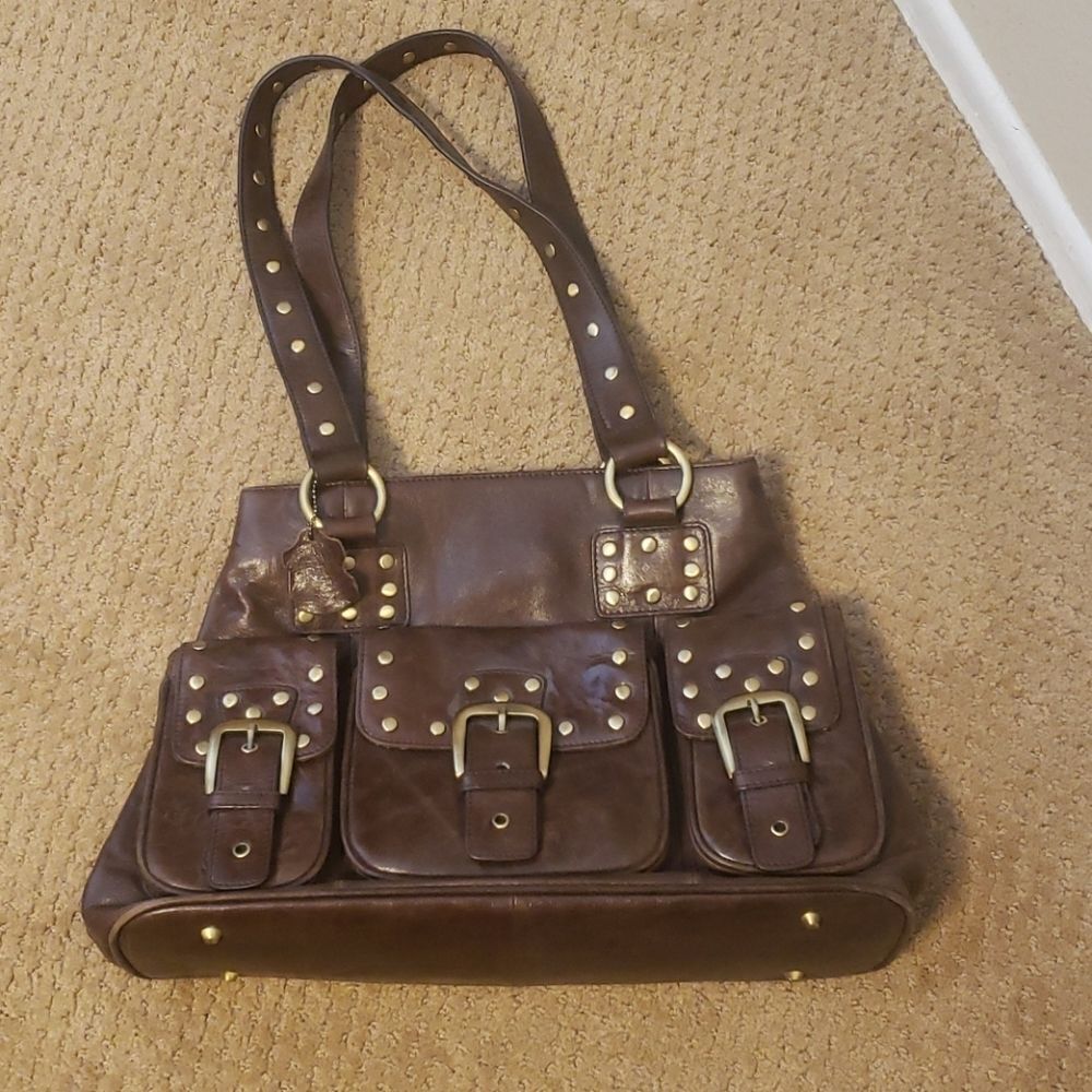 The find studded leather bag.‎